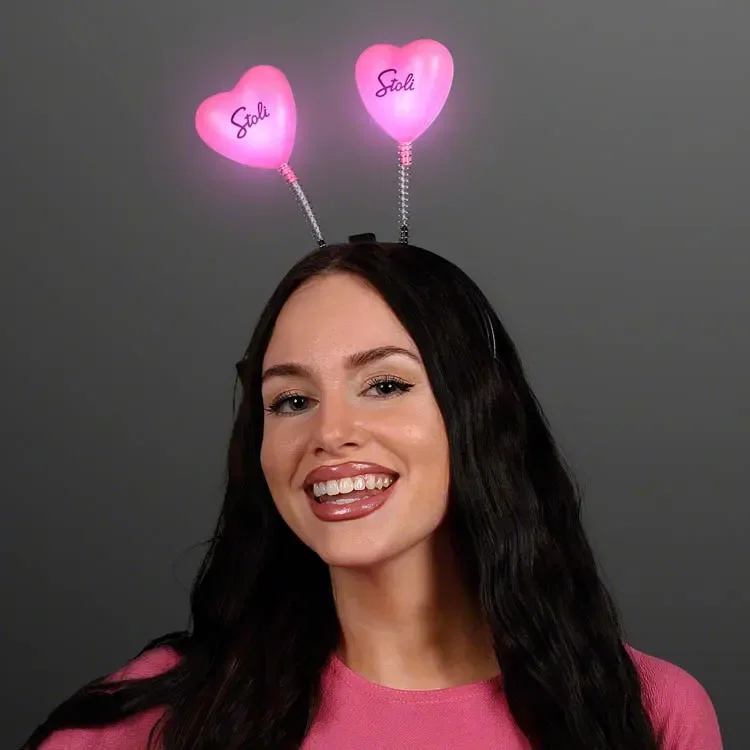 Light Up Love Hearts Head Boppers being worn