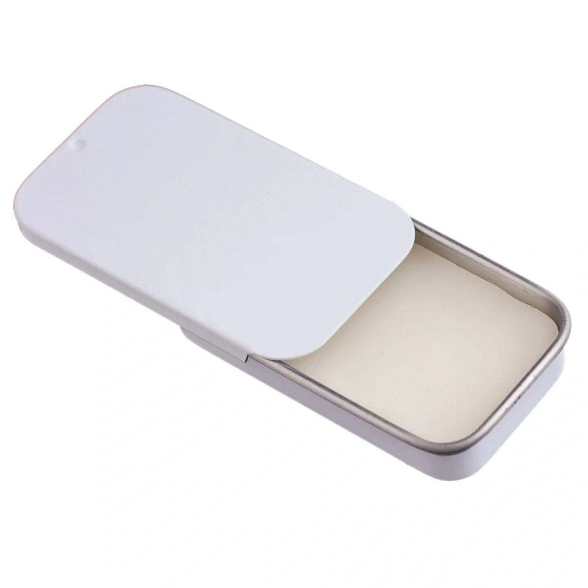 White slider tin holding lip balm, shown closed