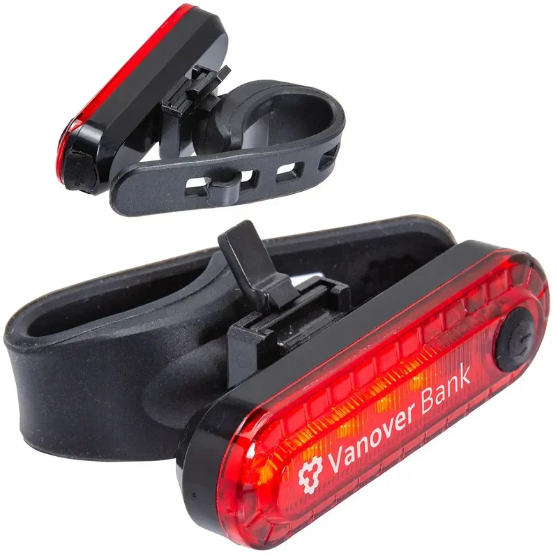 Branded Lucent bike taillight showing USB charging port, custom promotional light detail