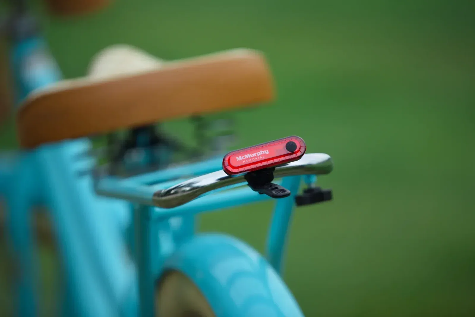 Promotional Lucent bike taillight mounted on a seatpost, custom branded safety light view