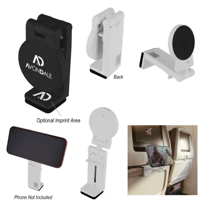 Magnetic phone holder that clips onto an airplane tray table