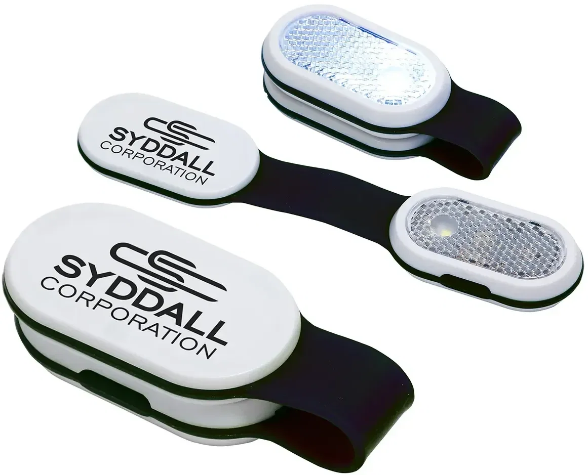 Back of the promotional Magna Clip safety light showing the magnetic clip and custom logo area