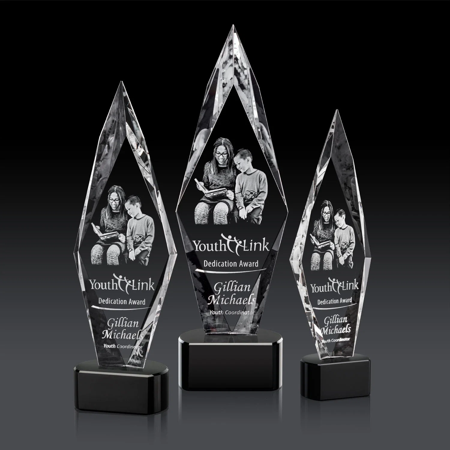 Branded Beveled Arrowhead Optical Crystal Award on Paragon Base for retirement presentations