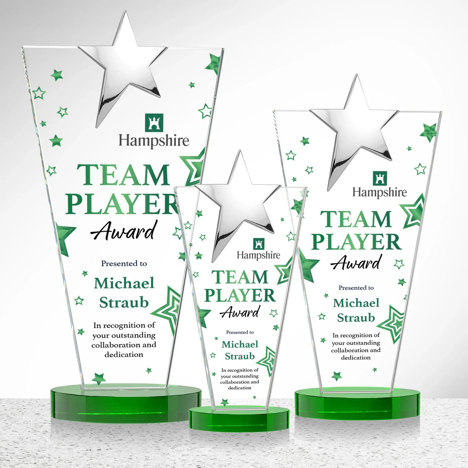 Custom engraved Starfire Crystal Award with Chrome or Gold Star on Oval Base for employee recognition
