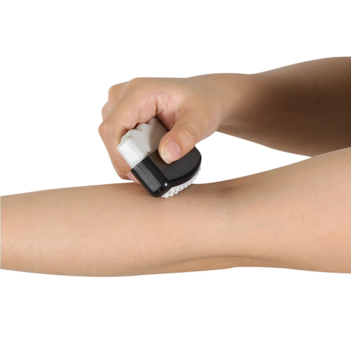 Promotional Manus Hand Exerciser & Massager in use, squeezed in the hand