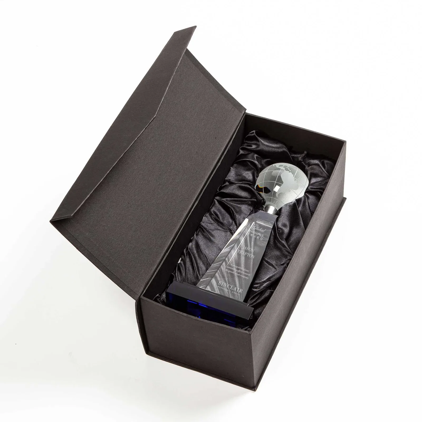 Custom Cobalt and Clear Crystal Globe Award on Silver Pedestal for sales achievement awards