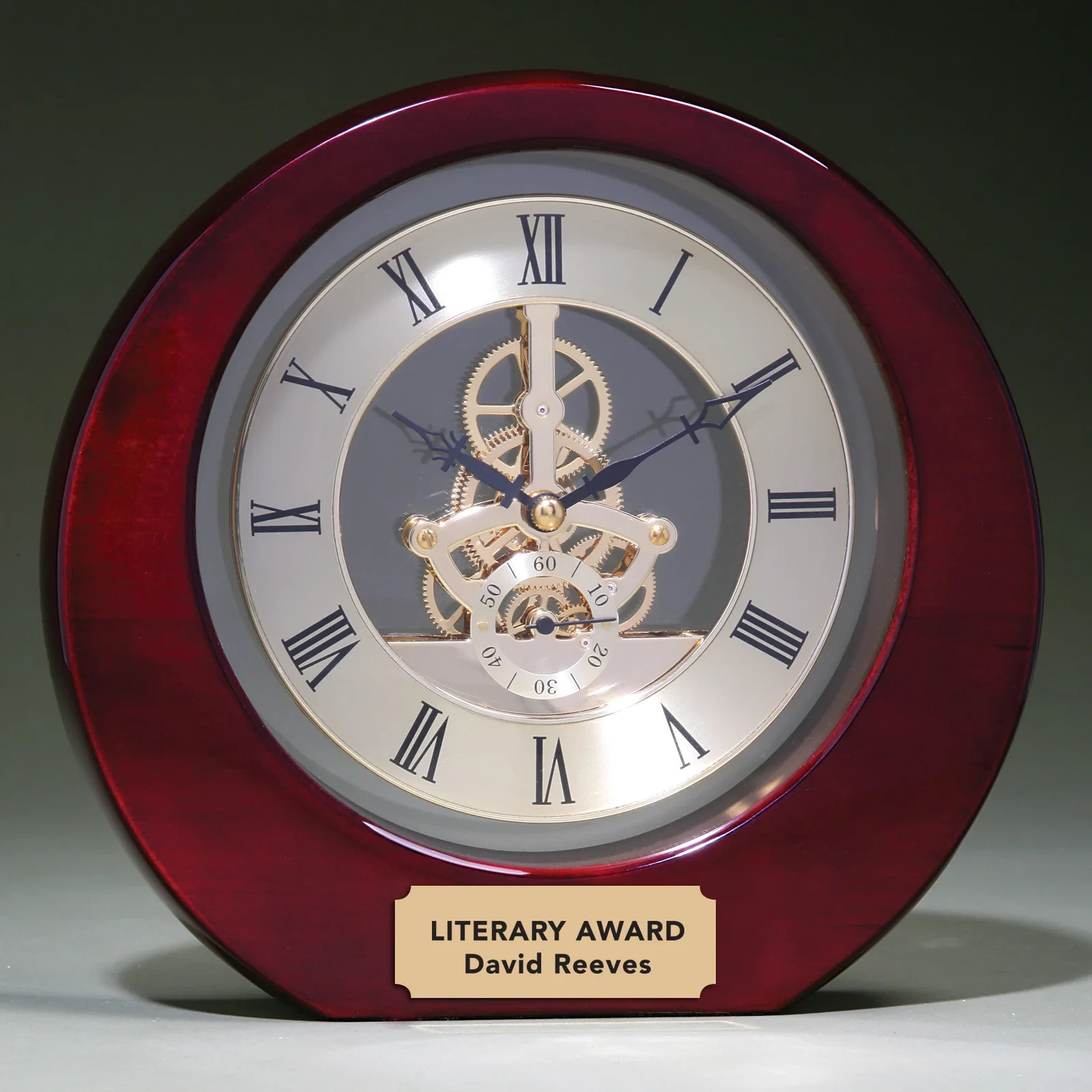 Custom Rosewood Round Clock With Gold Skeleton Floating in a Milled Cutout for employee recognition