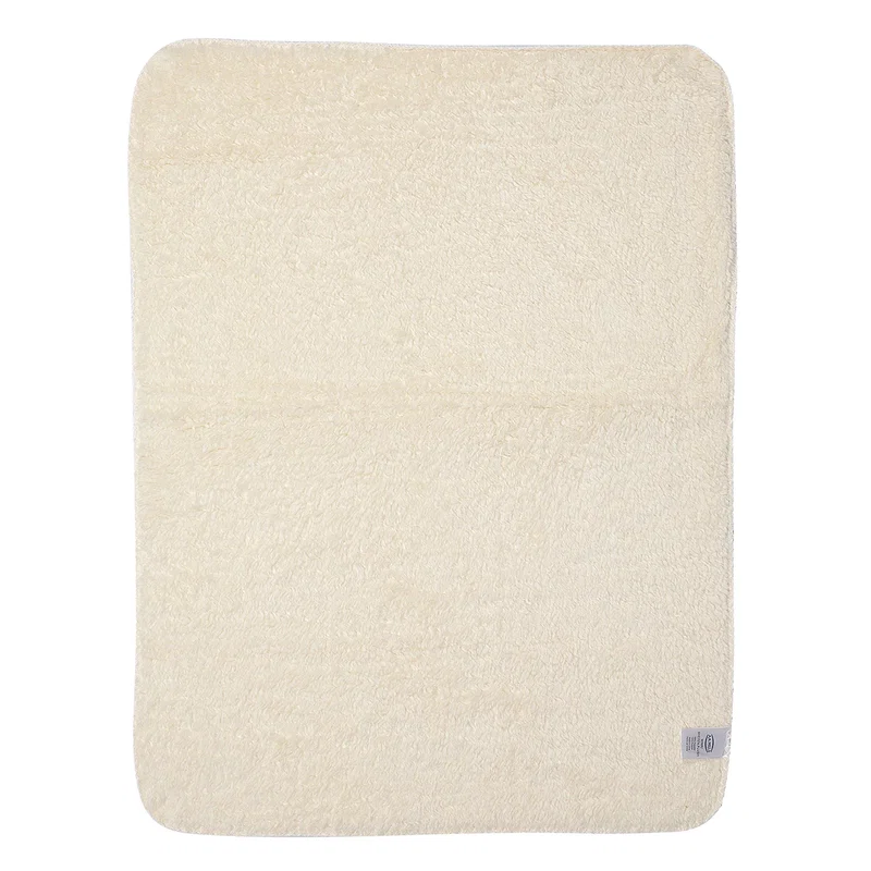 Micro-Mink 430GSM sherpa blanket shown rolled with a custom branded logo, third size option