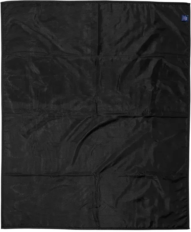 Branded micro-plush picnic blanket rolled into its carry strap, custom dye-sublimated throw
