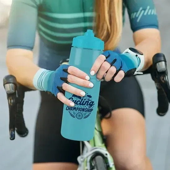 Mighty Shot Bike Bottle with Valve Lid (24 oz.) held in hand