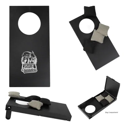 Mini corn hole game set up on a tabletop, under eight inches