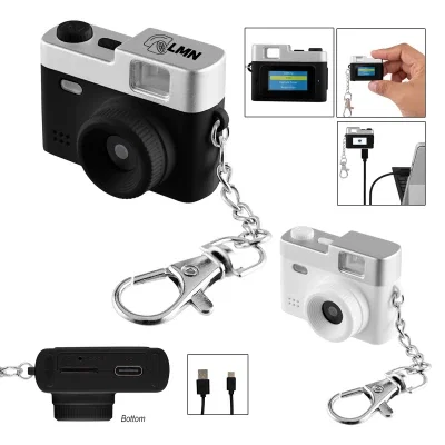 Miniature digital camera keychain shaped like a classic point and shoot