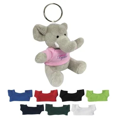 Small plush elephant key chain wearing a colored shirt