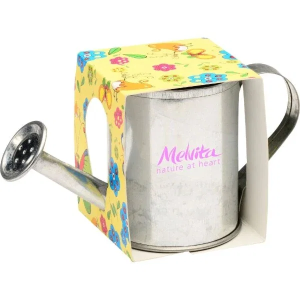 Mini watering can planter kit contents: can, soil disk, seeds and instructions