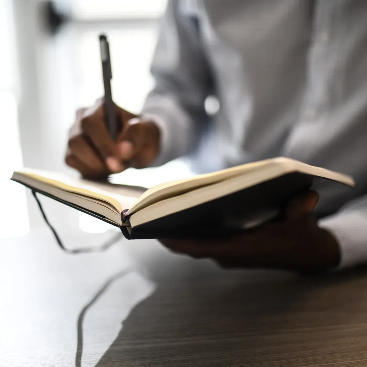 Moleskine® Hard Cover Ruled Large Expanded Notebook in use