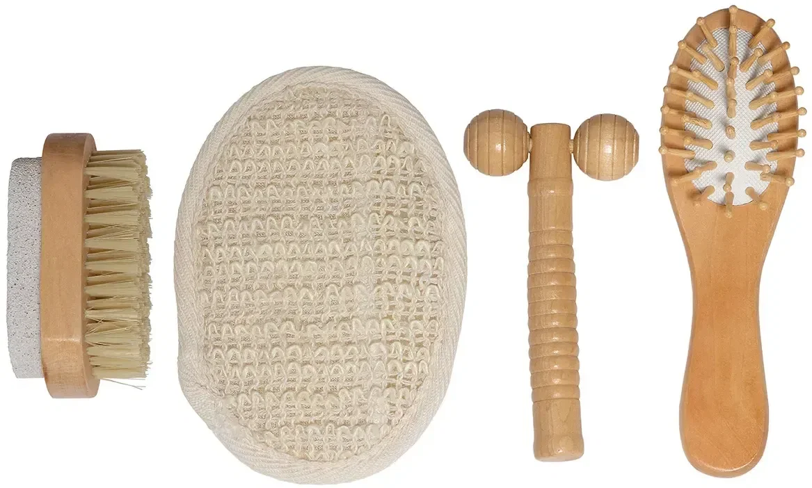 Branded wooden spa kit showing four wellness tools laid out