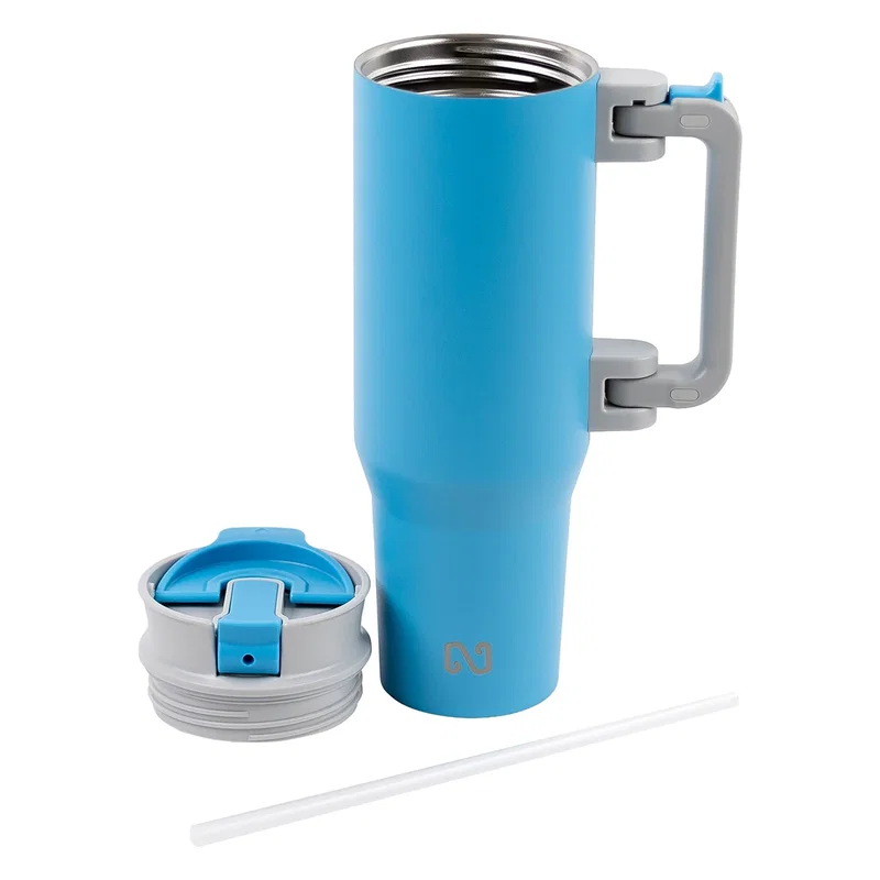 Promotional NAYAD Genesis Mug on a desk, branded travel mug lifestyle shot