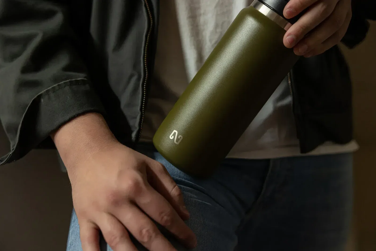NAYAD Traveler Insulated Bottle (2 Sizes) held in hand