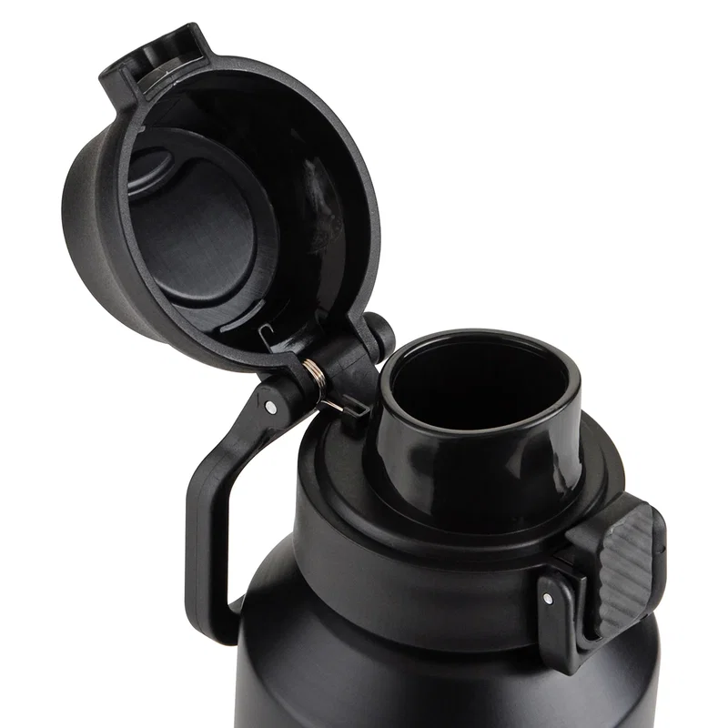 Nexus Aluminum Bottle with Carabiner packed in a gym bag, lifestyle shot