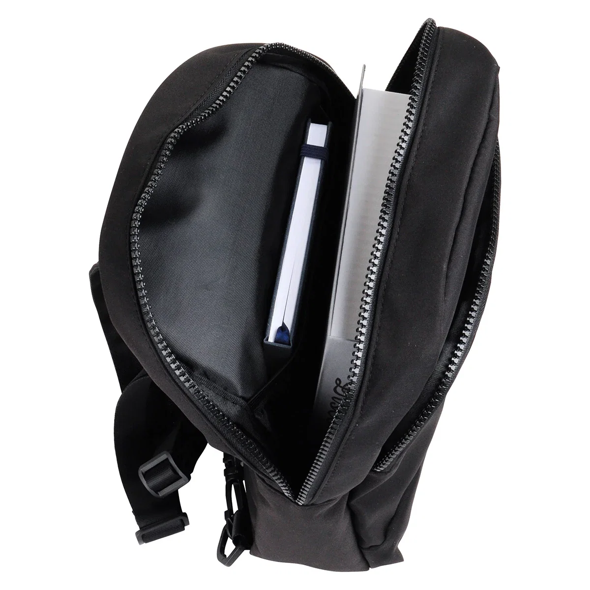 Close-up of the split-strap hardware on the custom Nexus Sling Backpack