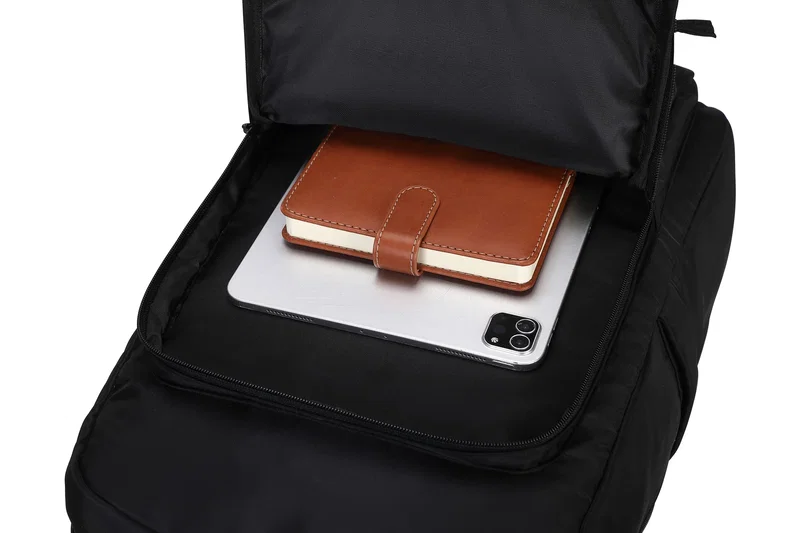 Custom Niro Twill Polyester Backpack worn on the shoulders, branded backpack lifestyle shot