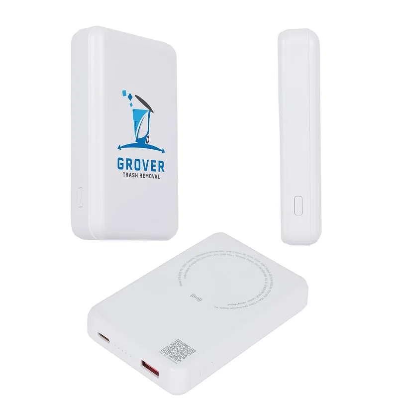 Noble Power Bank shown charging alongside a phone and earbuds, lifestyle shot