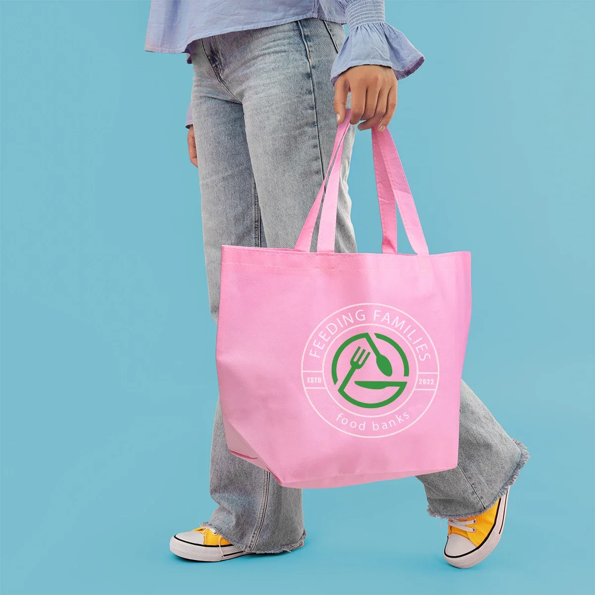 Non-Woven Budget Shopper Tote Bag held in hand