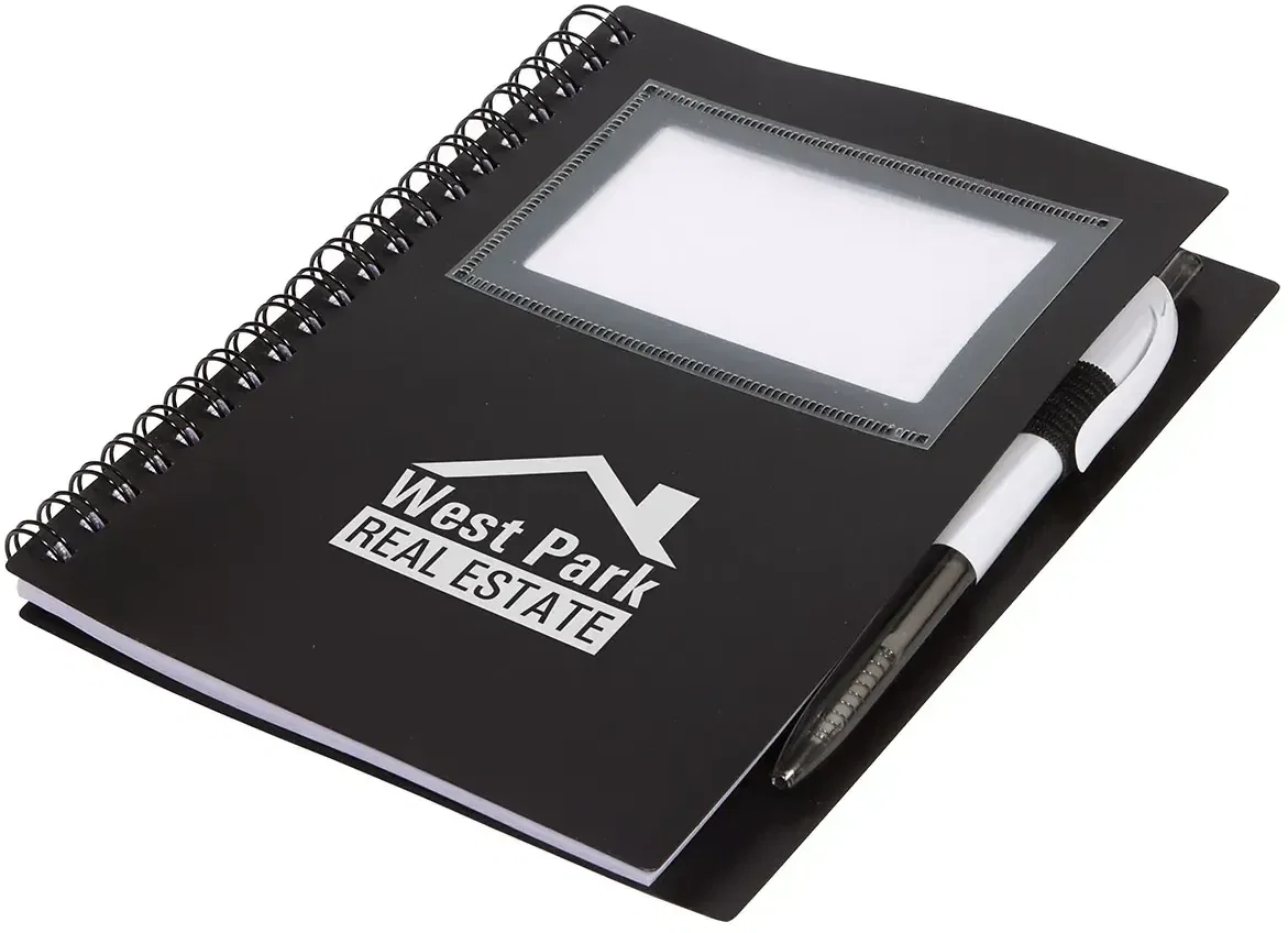 Open branded Note-It memo book showing pen loop and card slots, custom promotional spiral notebook