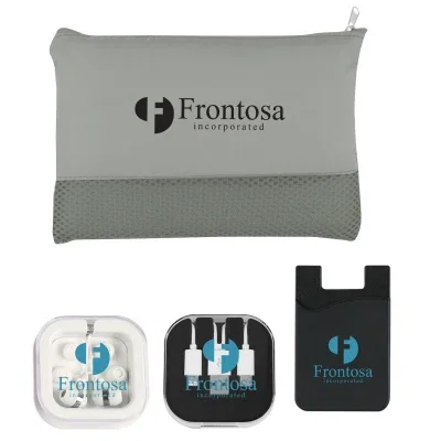 Tech essentials kit with accessories arranged for travel