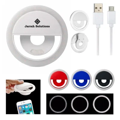 Black circular LED lamp shown from the front, powered off