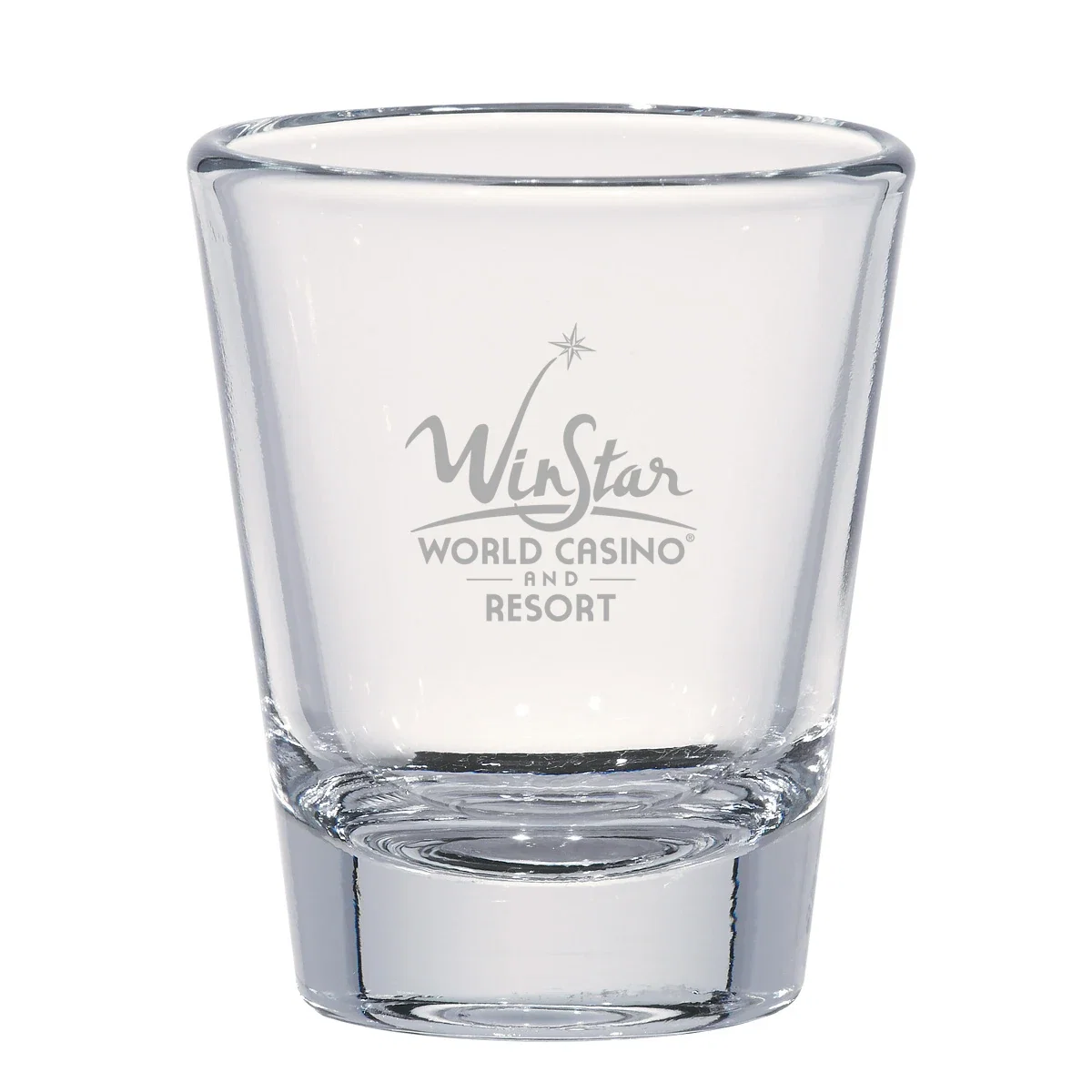 Shot glasses lined up along a bar counter