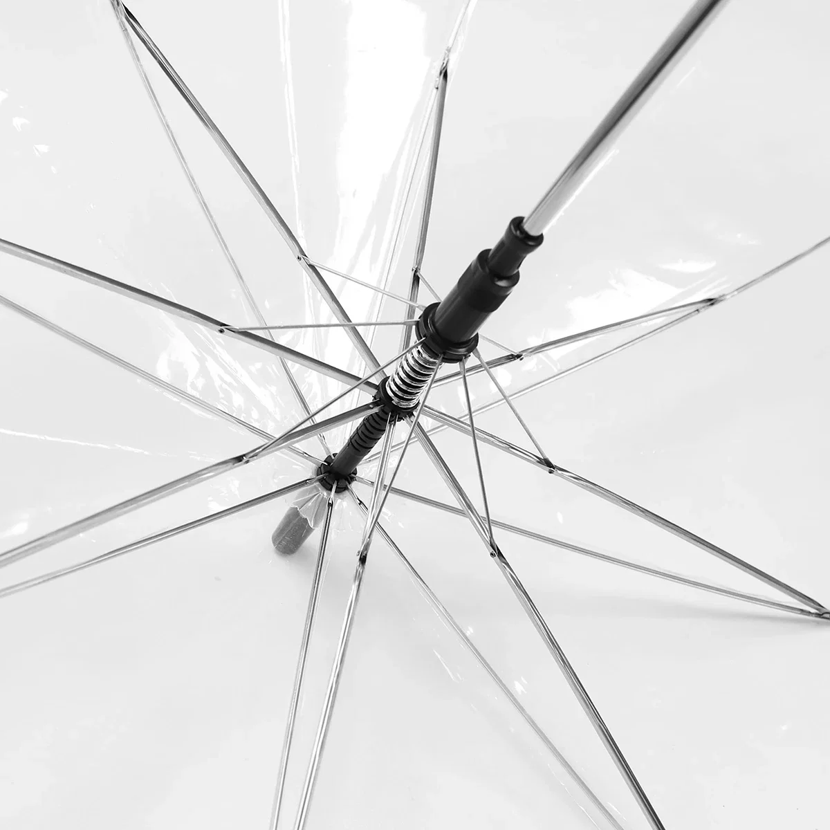 Panorama Clear Umbrella in use on a rainy day, branded umbrella lifestyle shot