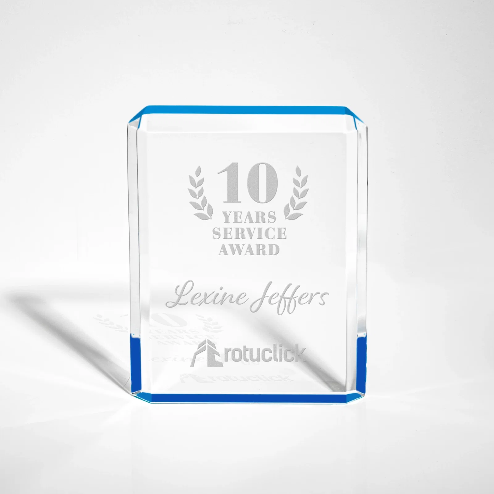 Custom Faceted Acrylic Award with Ice Blue Reflector Base for corporate award ceremonies