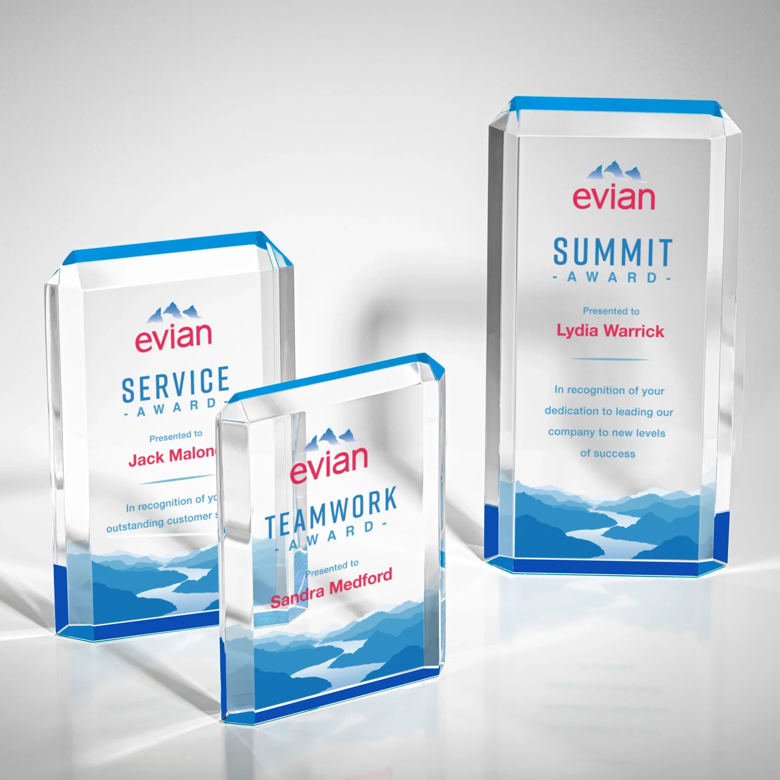 Custom Faceted Acrylic Award with Ice Blue Reflector Base for retirement presentations