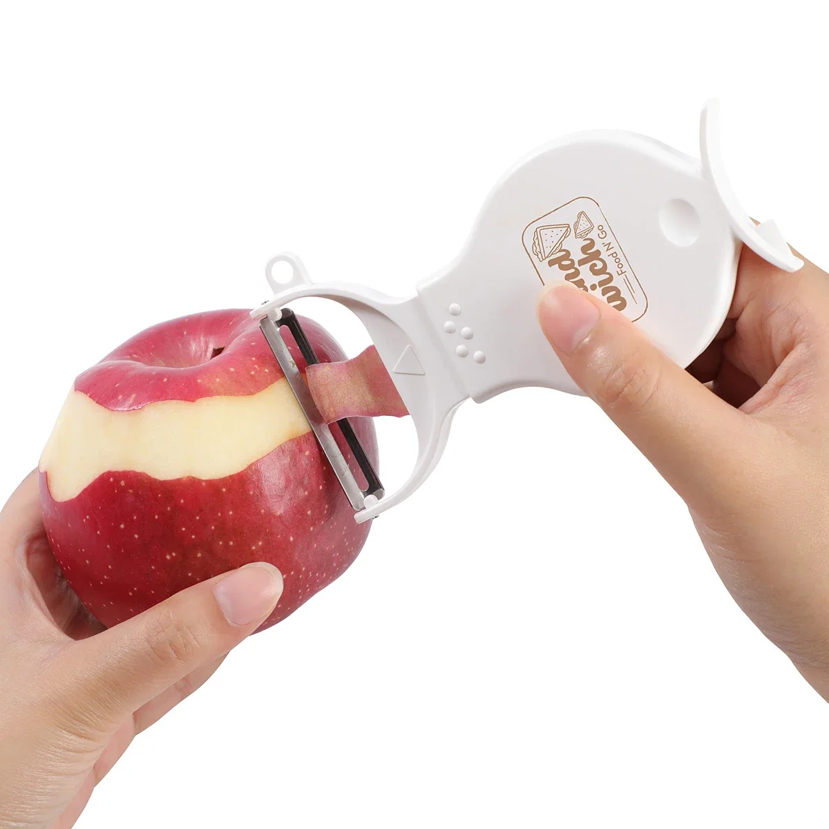 Close-up of the Pare 3-in-1 Peeler & Grinder's blade and grinder head