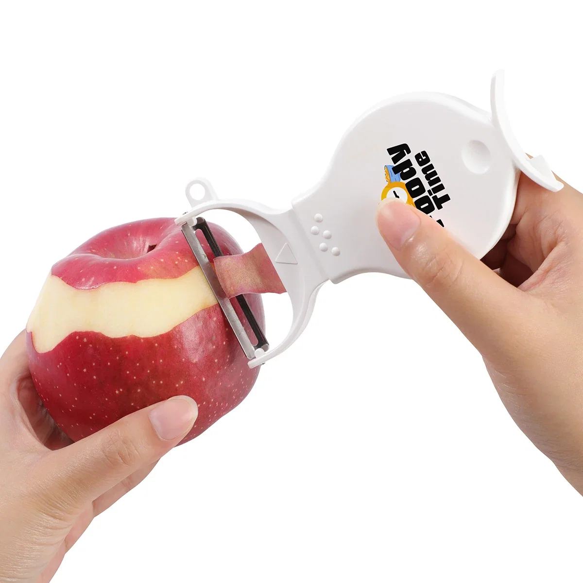 Branded Pare 3-in-1 Peeler & Grinder in use peeling a vegetable