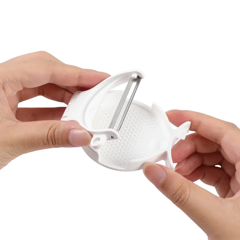 Close-up of the custom Pare 3-in-1 Peeler & Grinder's logo imprint area