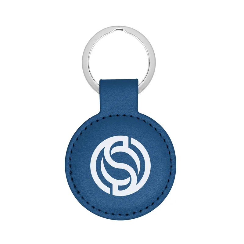 Keys clipped to the soft round leatherette holder