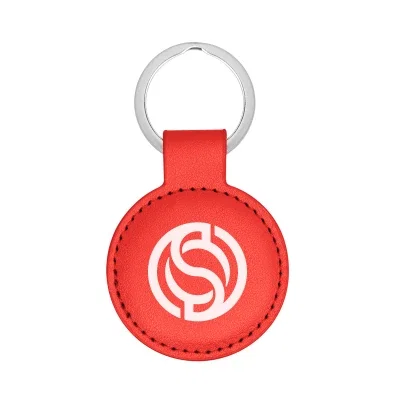 Disc tag in royal blue shown beside its split ring