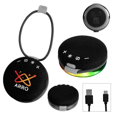 Round light-up speaker measuring four inches across