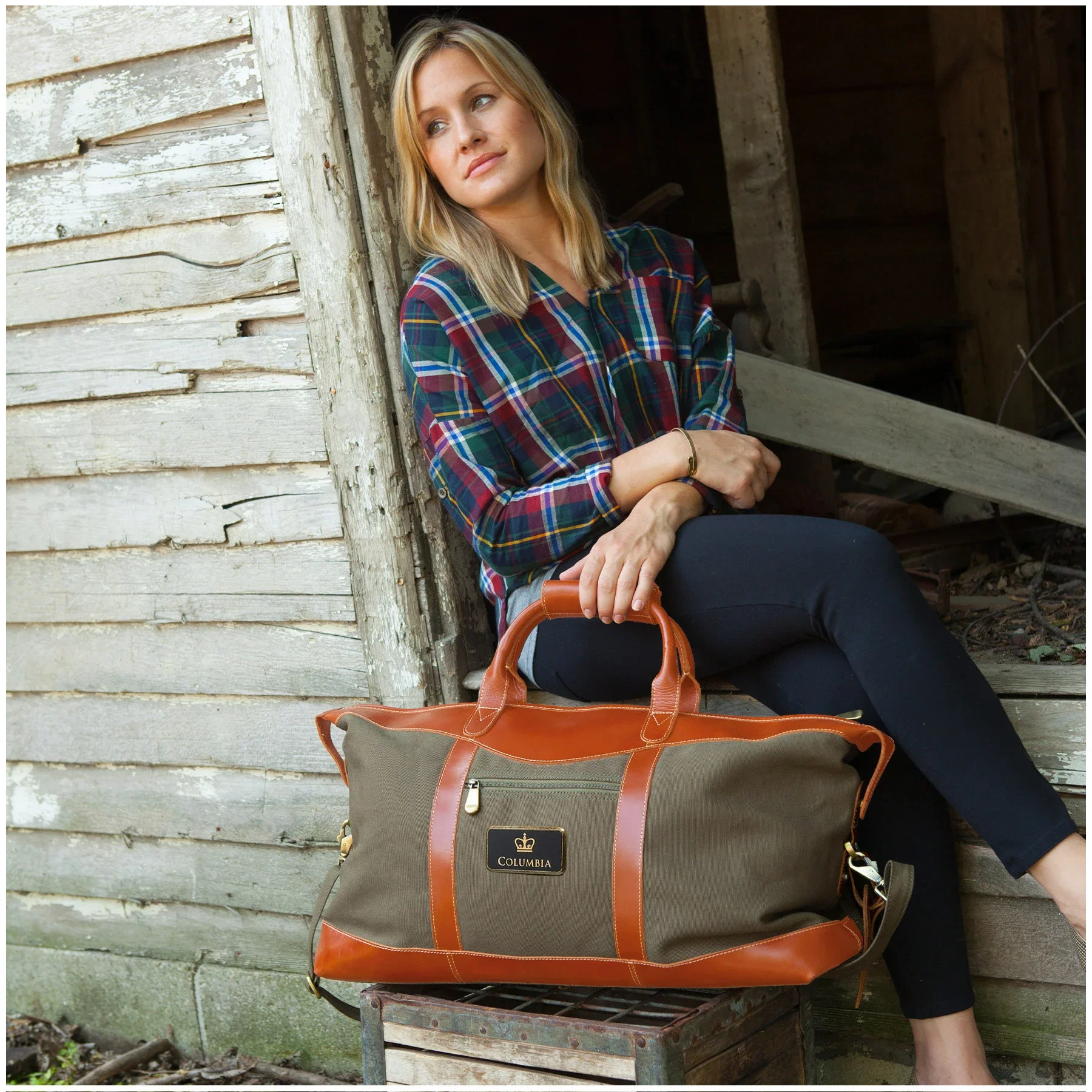 Pine Canyon Leather Duffel Bag held in hand