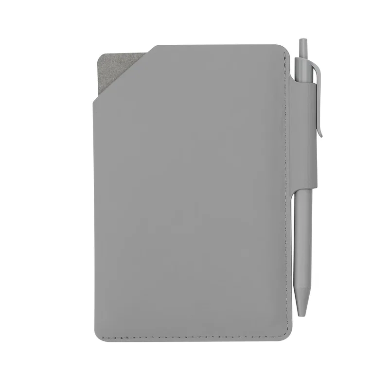 Held in one hand to show the size of the jotter pad