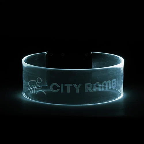 Pixie light-up wristband in green glow, custom branded promotional LED event wristband