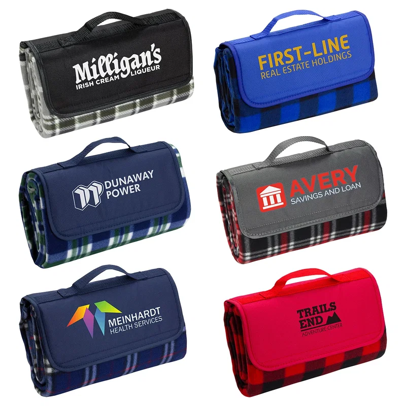 Promotional roll-up fleece blanket shown carried by the strap