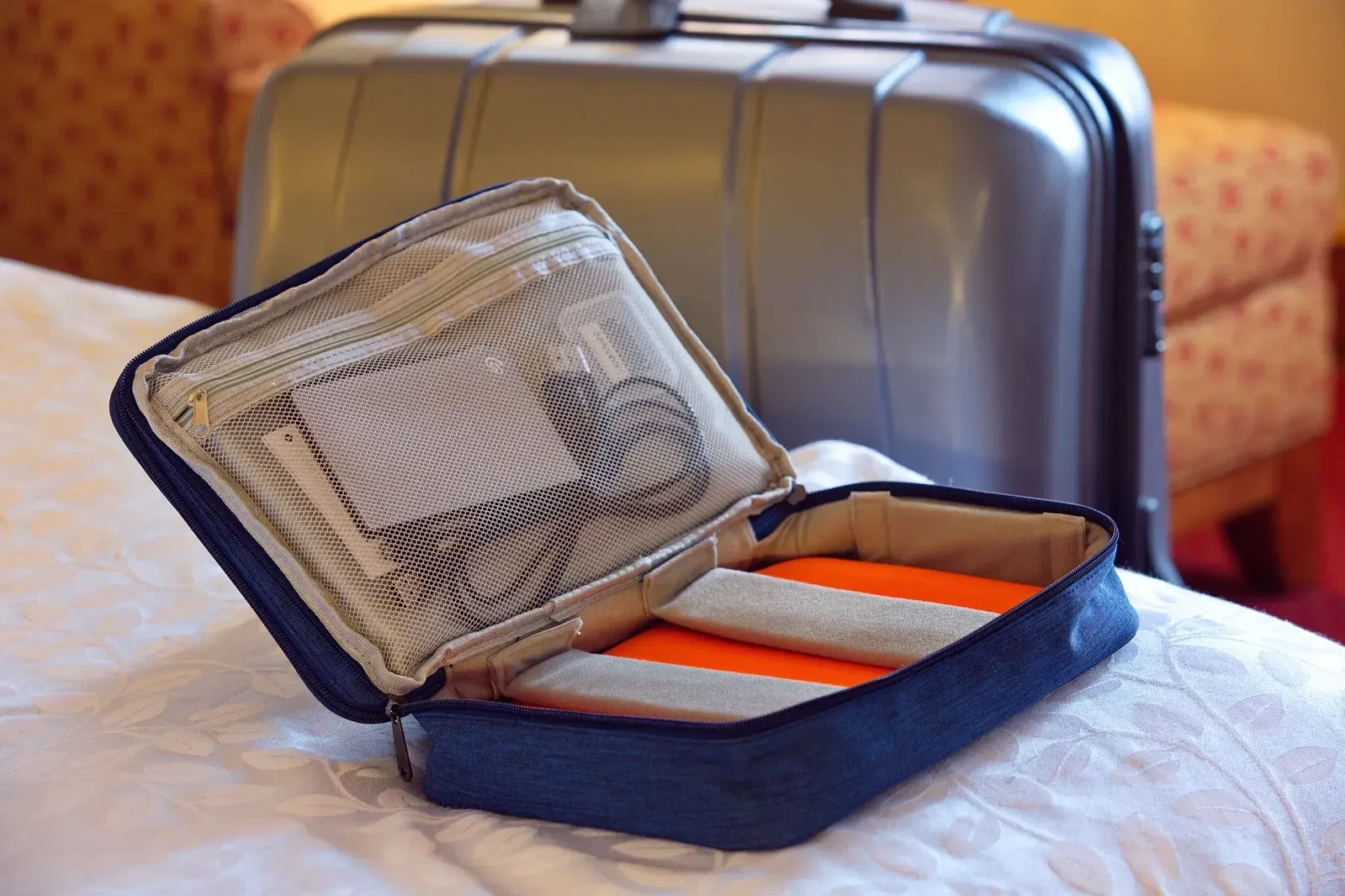 Custom Porta Power organizer open showing eight pockets holding chargers and cables