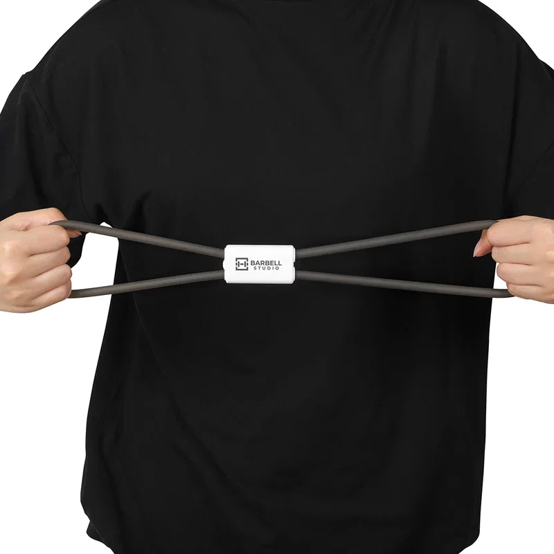 Power Reach Fitness Band & Expander in use, branded expander stretched during a workout
