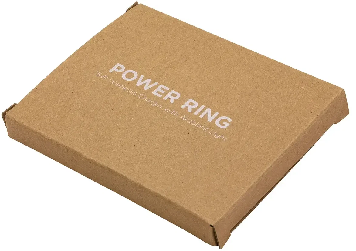 custom Power Ring 15W charger, angled view with phone charging on the pad