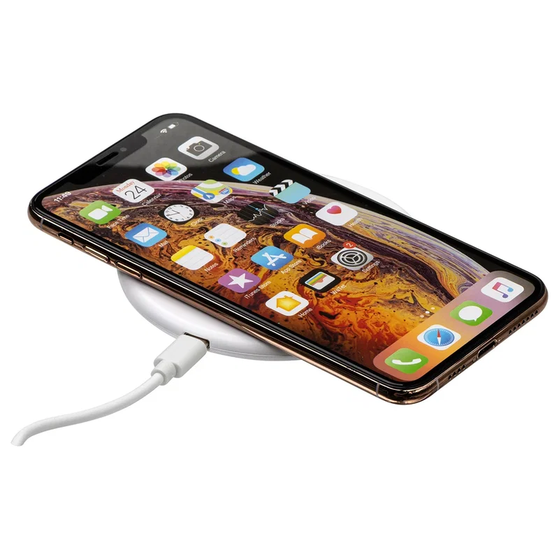 Power Up 15W Wireless Charger on a desk, angled lifestyle shot of the branded charger