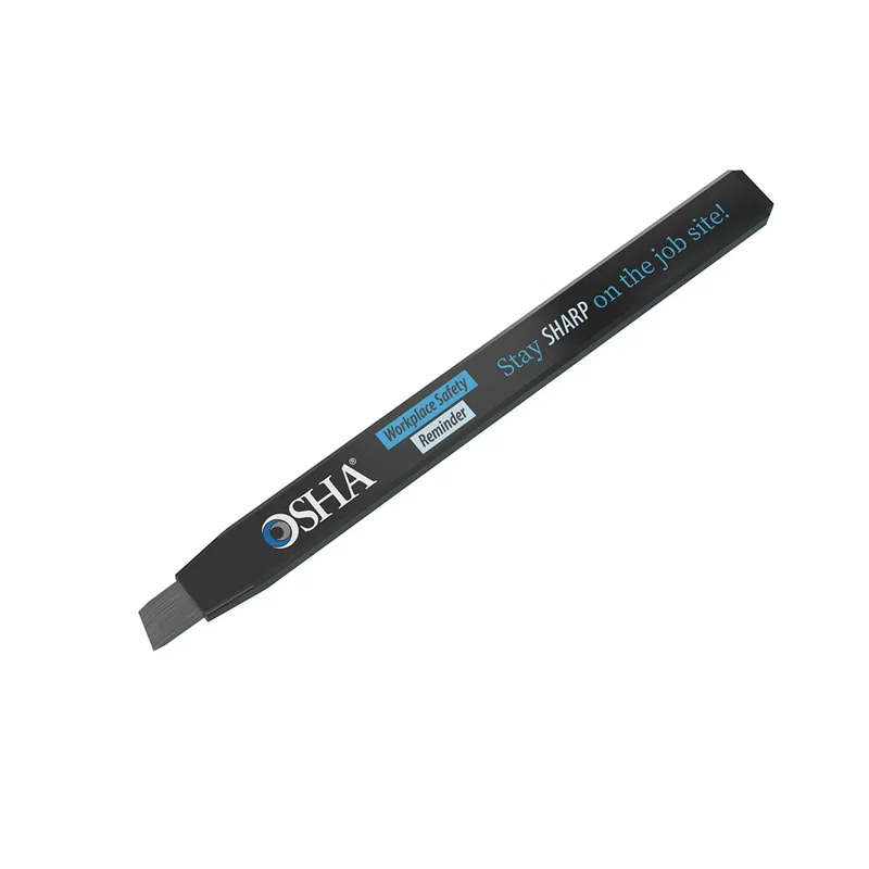 Black pencil held in hand while writing a note