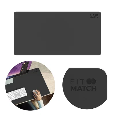 Extended black desk mat covering most of a workspace